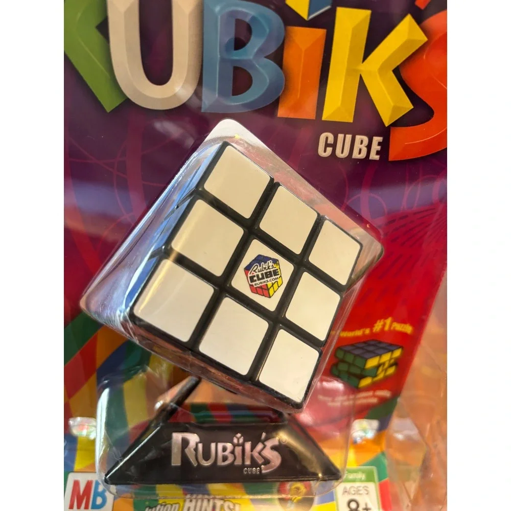 Milton Bradley Rubiks Cube 3x3 Puzzle with Stand and Booklet 54033 New Sealed